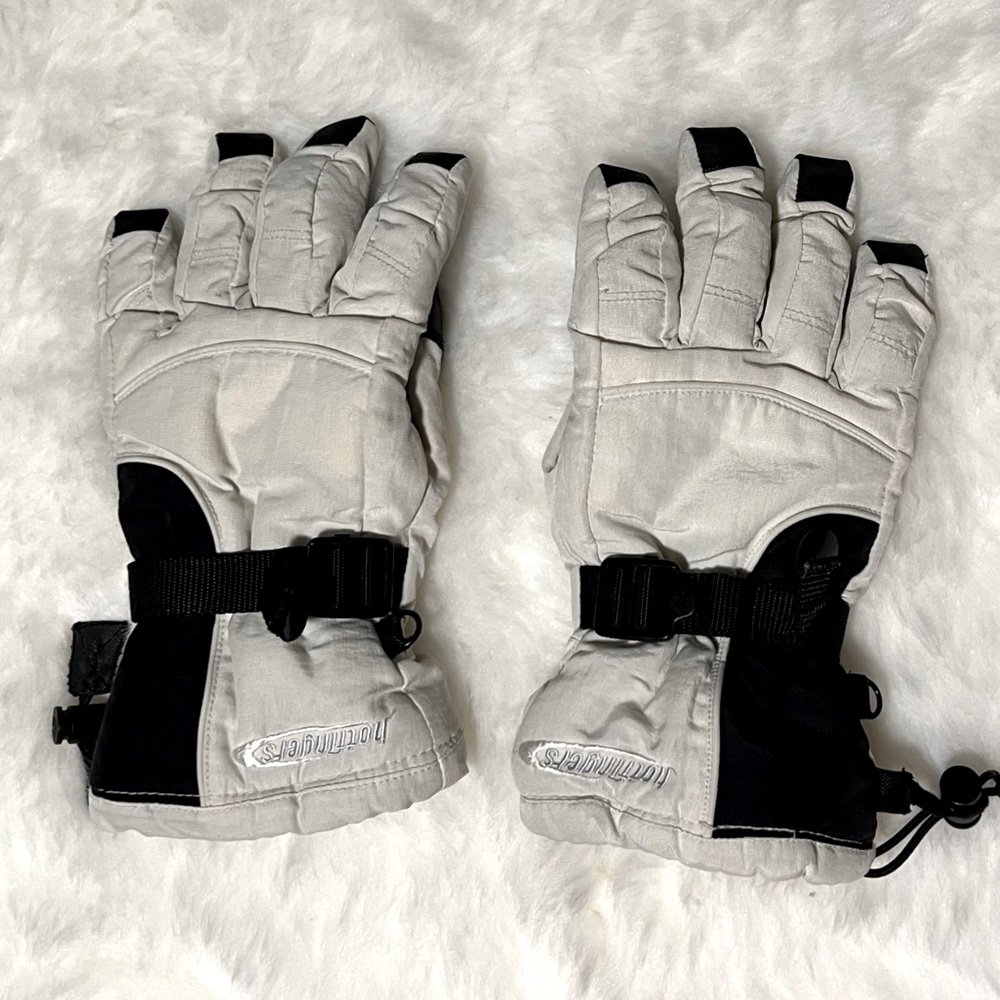 Women’s pair of white and black ski gloves size Medium